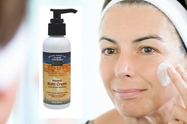 Lady apply night cream